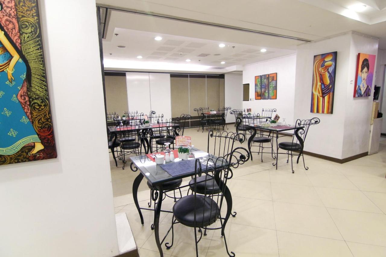 Oyo 103 Artina Suites Hotel Макати Экстерьер фото