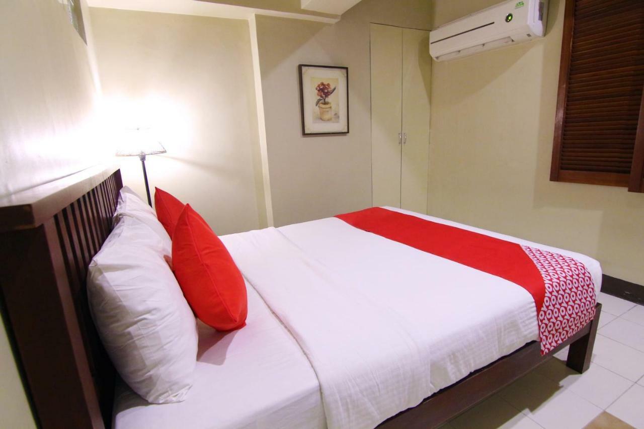 Oyo 103 Artina Suites Hotel Макати Экстерьер фото