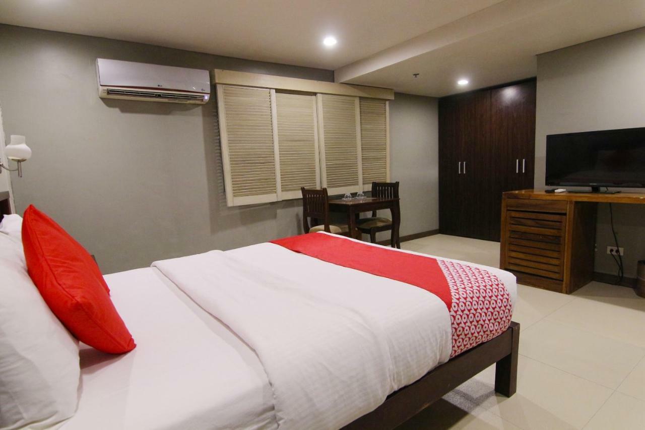 Oyo 103 Artina Suites Hotel Макати Экстерьер фото