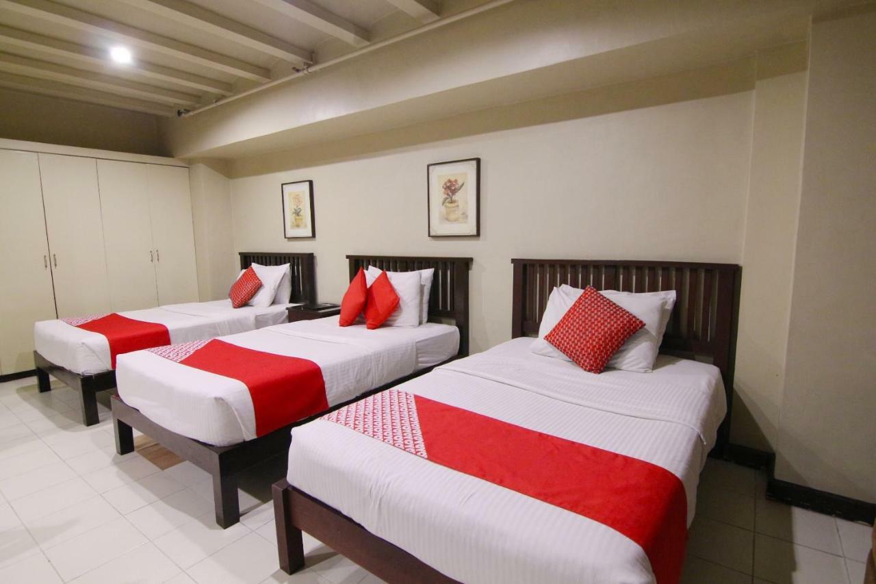 Oyo 103 Artina Suites Hotel Макати Экстерьер фото